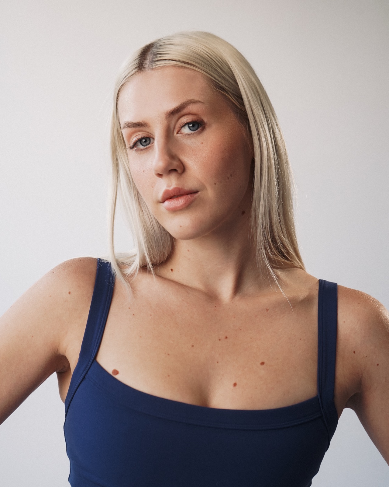 Ida Angelma in a navy sports top, close-up
