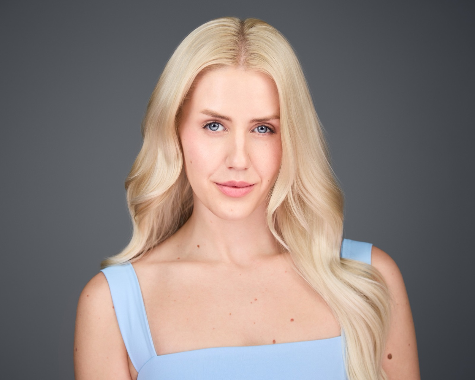 Ida Angelma in a light blue top