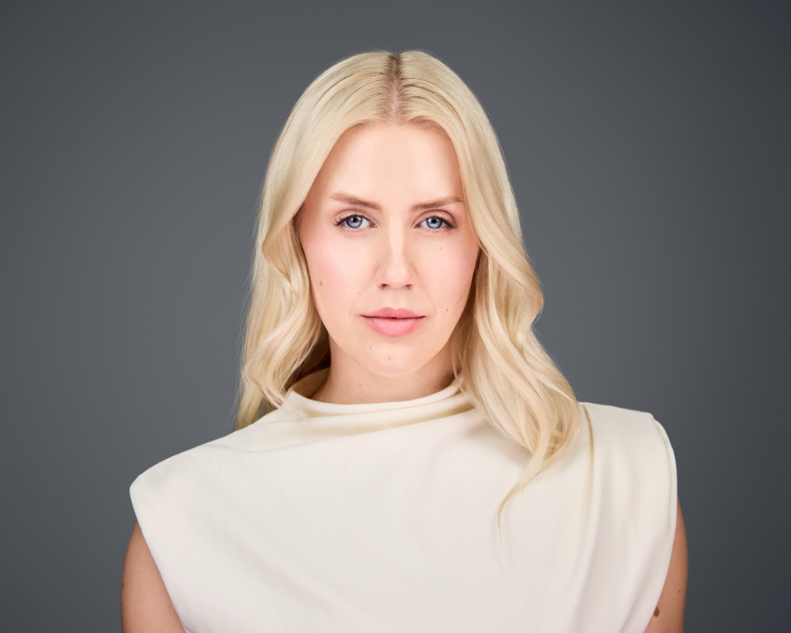 Ida Angelma in a cream draped top